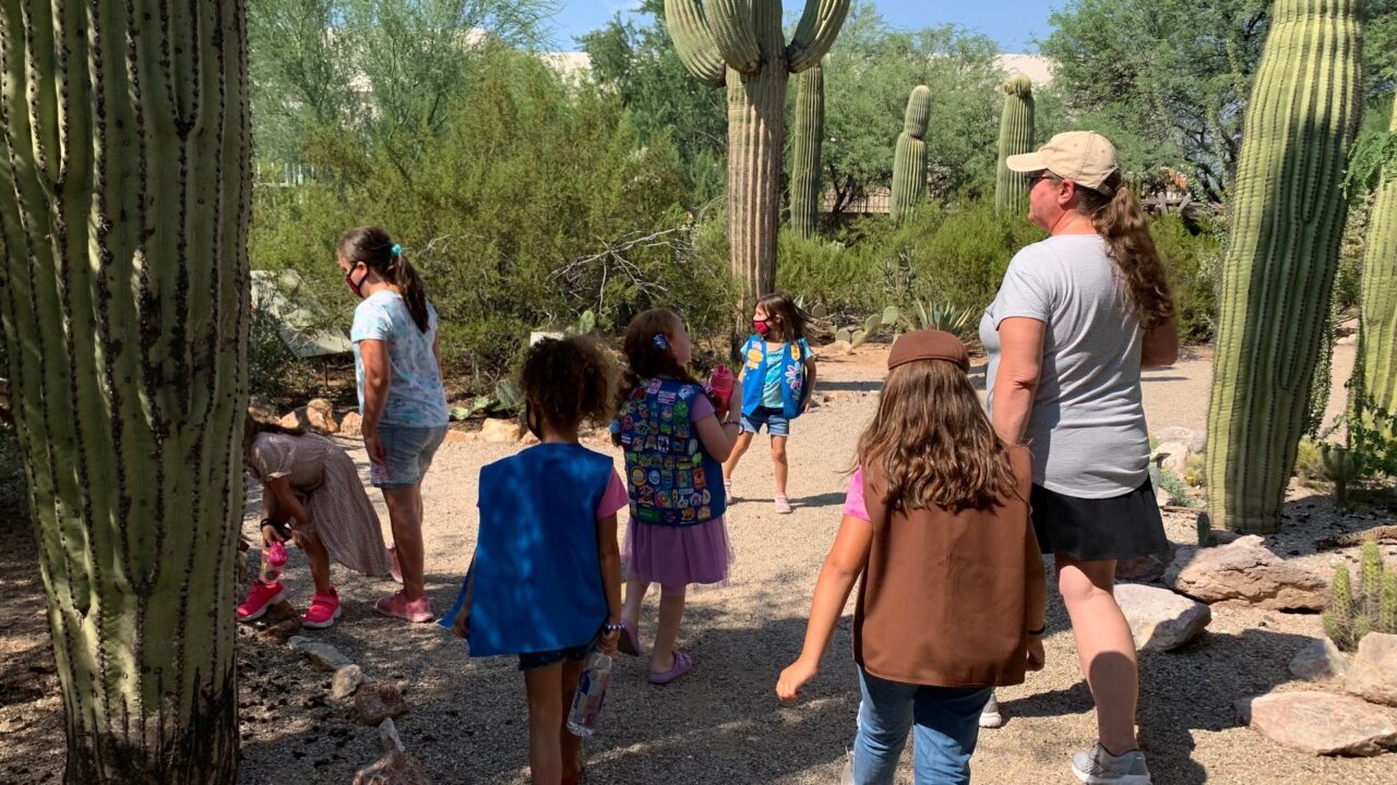 Photograph of group of guests and children